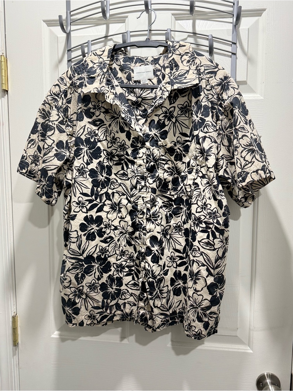 American Eagle Outfitters Black Floral Button-Down Shirt on Cream